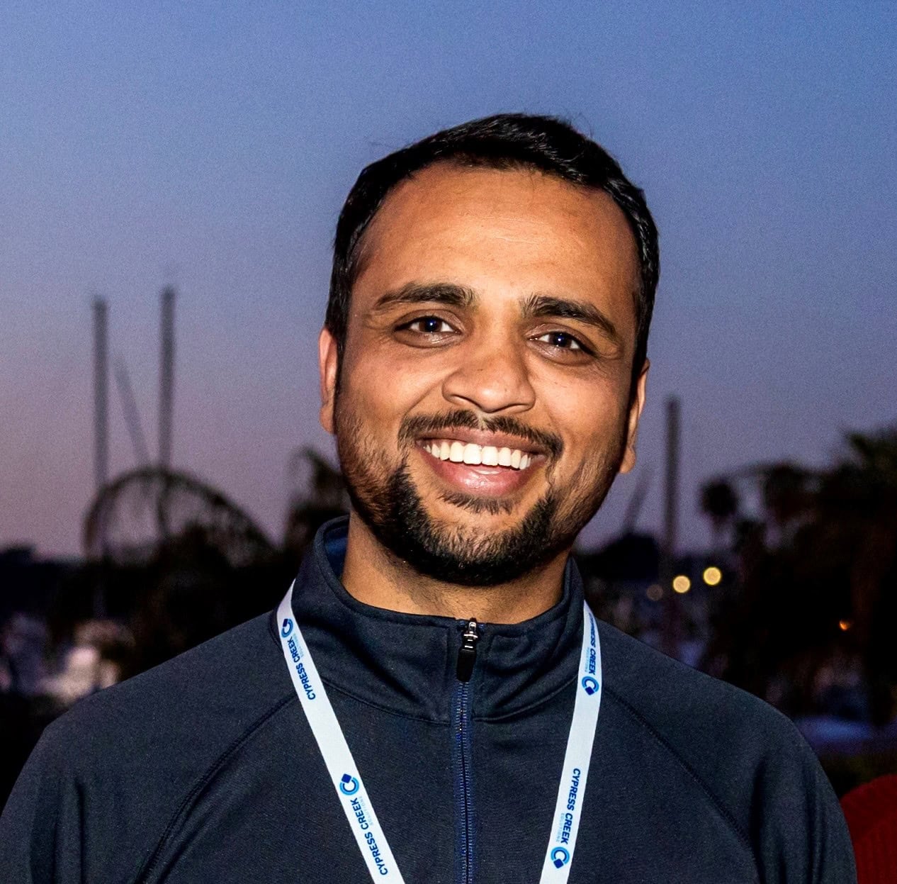 A man smiling at the camera