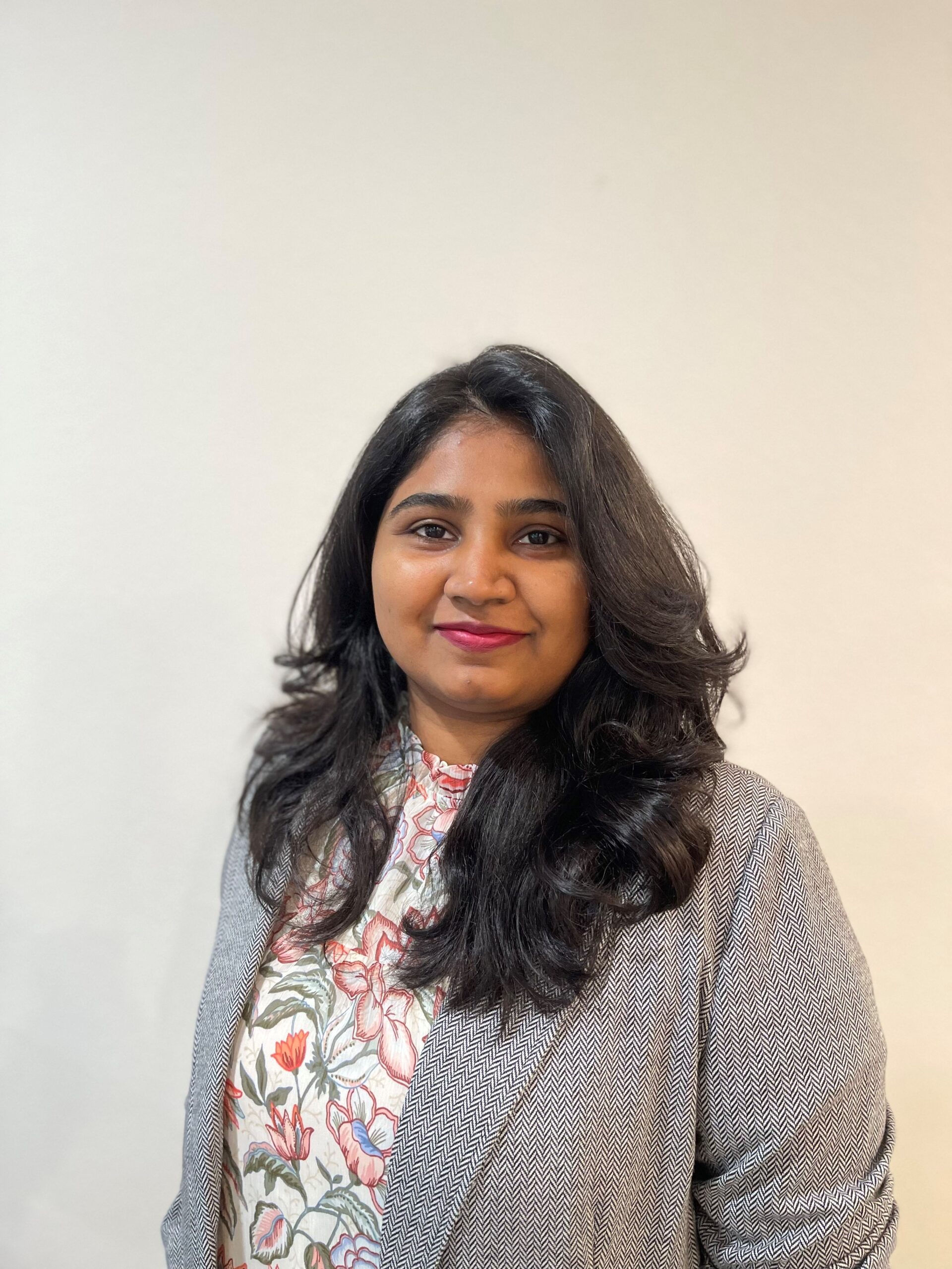 A photo of a woman in a suit